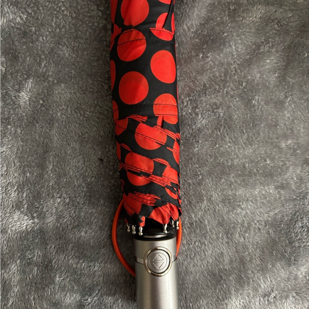 Vibrant Red and Black Umbrella with Polka Dots